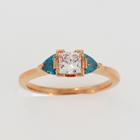 14 karat rose gold bezel-setting with princess-cut diamond and blue diamond trilliants.