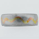 Brushed Platinum canyon band with multi-colored gold inlay.